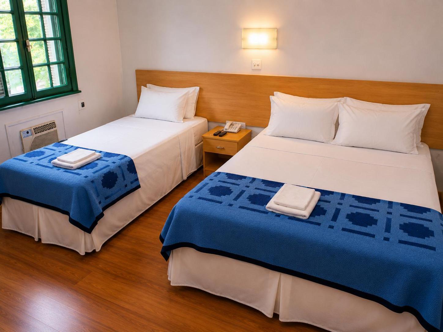 Camera Tripla con Letto Matrimoniale